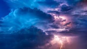 clouds with thunder digital wallpaper illustrating the need for spiritual energy clearing